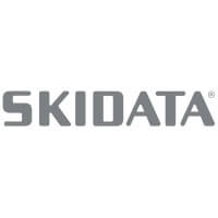 SKIDATA Logo in grauen Großbuchstaben, Symbol für Technologiepartner in Salzburg und Inklusion